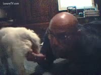 Bald chap gives oral job sex to dog